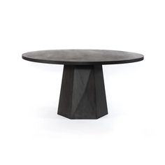 a round table with a black base and an oval shaped design on the top, against a white background