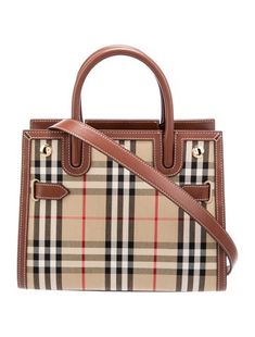 Burberry Top Handle BagNeutrals CanvasPlaid PrintGold-Tone HardwareRolled Handles & Single Adjustable Shoulder StrapLeather Trim EmbellishmentLeather Lining & Five Interior Pockets with Card SlotsZip Closure at TopProtective Feet at BaseIncludes Dust Bag Burberry Top, Designer Gifts, Bag Handle, Chanel Shoes, Branded Bags, Handle Bag, Canvas Leather, Burberry Bag, Christian Louboutin Shoes