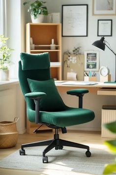 a green office chair sitting on top of a rug in front of a wooden desk