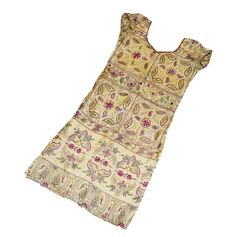 "Item Description Stunning pure silk off white colored hand embroidered kantha long Kurta Top. This dupatta is adorned with beautiful peacock design pink, yellow, green, brown thread work all over done. This stole from Bengal is hand embroidered with the traditional kantha running stitch in a beautiful floral pattern. Specialties :: KANTHA:Kantha is a hand embroidery style traditionally practiced by rural womenfolk in state of West Bengal. Kantha embroidery is recognized by running stitches. The Bohemian Chanderi Embroidered Dress With Resham Embroidery, Traditional Raw Silk Embroidered Dress With Zari Work, Traditional Raw Silk Embroidered Dress, Traditional Embroidered Raw Silk Dress, Traditional Cream Embroidered Blouse Piece, Traditional Beige Embroidered Dress With Resham Embroidery, Traditional Embroidered Cream Blouse Piece, Traditional Cream Embroidered Festive Dress, Festive Cream Embroidered Dress With Chikankari