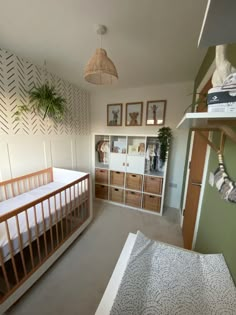 a baby's crib in the corner of a room