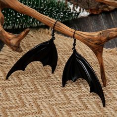 Embrace the mysterious allure of nocturnal creatures with these striking Halloween Black Bat Earrings. These gothic-inspired dangle earrings are perfect for making a bold statement at your next Halloween party or for adding a touch of dark glamour to your everyday ensemble. With their intricate design and attention to detail, these bat earrings will effortlessly soar above your other fashion accessories, capturing the essence of the night and showcasing your unique style. Why You'll Love It Cree Halloween Costume Jewelry, Hanging Bat, Halloween Fest, Black Bucket Hat, Bat Earrings, Halloween Gothic, Black Bat, Halloween Black, Fete Halloween