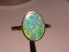 (eBay) Brilliant Opal Ring - solid 14 k Yellow Gold - Top Gem Quality Handmade Opal Ring For Formal Events, Handmade Opal Ring For Formal Occasions, Handmade Fine Jewelry Opal Ring For Formal Occasions, Classic Handmade Round Opal Ring, Handmade Classic Opal Ring, Handmade Round Opal Ring For Formal Events, Untreated Formal Rings, Classic Handmade Emerald Ring, Classic Handmade Opal Ring