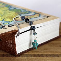 a book with some beads on top of it