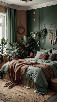 a bedroom with green walls and lots of plants