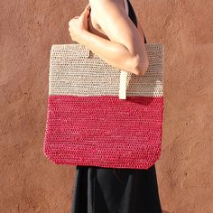 Raffia Shoulder Bag straw Natural and Red color


This textured bag is perfectly packable and made to fit just about anything that's needed for all your summer outings. French Baskets designer styles that won’t break the bank


Size Info

 	Size Approx inches: Straw Raffia Bag H 16 in x L15 in leather handle 23 in
 	Size Approx cm: Straw Raffia Bag H40 cm x L38 cm leather handle 60 cm

Estimated delivery 

 	USA, EU, CA :  5 – 8 days Red Handmade Bags For Summer, Handmade Red Bags For Summer, Handmade Red Beach Bag For Everyday, Red Woven Crochet Bag For Travel, Red Woven Crochet Travel Bag, Eco-friendly Handmade Red Bag, Eco-friendly Red Handmade Bags, Eco-friendly Red Shoulder Bag For Shopping, Red Handwoven Crochet Travel Bag