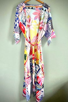 Printed Beach Dress For Spring Holiday, Pink Abstract Print Maxi Dress For Summer, Pink Maxi Dress With Abstract Print For Summer, Multicolor Summer Kimono For Beach Cover-up, Multicolor Print Dress For Beach Party, Beach Tropical Print Dress, Vibrant Multicolor Print Dresses For The Beach, Vibrant Multicolor Print Dresses For Beach, Vibrant Multicolor Print Beach Dresses