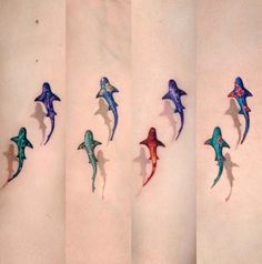 six different colored sharks on the back of a woman's stomach, all in different shapes and sizes