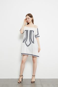 ProductDescription: This chic easy pull-over dress is made to be wornthroughout the summer. This one size dress fits most from S-L (0-10) and can easily be dressed up or down. Just add your favorite wedges or strappy sandals and get ready for a cute beach day.Care & Content: 95% Poly | 5% Spandex Casual Mini Dress With Elastic Neckline, Spring Beach Mini Dress With Elastic Neckline, Summer Mini Dress With Elastic Neckline For Day Out, Summer Sundress With Elastic Neckline For Vacation, Casual Tunic Mini Dress For Summer, Sundress With Elastic Neckline For Vacation, Vacation Sundress With Elastic Neckline, Summer Vacation Mini Dress With Elastic Neckline, Flowy Summer Mini Dress With Elastic Neckline