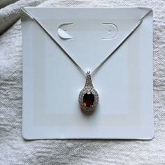 Garnet Necklace With Sterling Silver 18” Chain. Never Worn. Classic Red Pendant Necklace, Classic Red Oval Pendant Necklace, Classic Red Teardrop Pendant Necklace, Classic Red Teardrop Pendant Jewelry, Garnet Necklace Silver, Garnet Silver Necklace, Elegant Red Garnet Necklace, Bohemian Garnet Necklace, Faceted Garnet Red Necklace