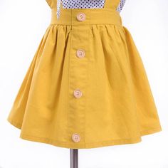 *Title: Toddler Girl Polka Dot Pattern Strap Dresses & Bow Headgear Children's Clothing*Ketword tag: trendy baby clothes wholesale* Fabric: Cotton,Polyester * Season: Summer * Thickness: Regular * Care Label: On the inside Dresses Bow, Toddler Patterns, Overall Skirt, Trendy Baby Clothes, Dot Shirt, Strap Dresses, Yellow Skirt, Girl Princess Dress