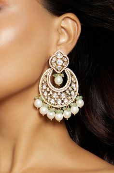 Royal Kundan Polki Chand Baali Earring - Joules By Radhika This designer chand baali earring is handcrafted with multi shaped polkis with baroque pearls & green agates. Ideal to be worn on festive, wedding & party occassions on your Indian & fusion attire.Every artistic piece from Joules by Radhika is made with real semi precious stones only, giving it a regal look & feel. SET INCLUDES: Earrings Details: Handcrafted with ❤️ Metal: Brass Product Type: Earrings Stone: Hydro Polkis, Baroque Pearls, Fusion Style Kundan Pearl Earrings With Meenakari, Green Fusion Style Chandbalis With Cutdana, Green Cutdana Chandbalis In Fusion Style, Green Cutdana Fusion Chandbalis, Fusion Kundan Jhumkas With Pearl Drop, Fusion Chandbali Pearl Drop Danglers, Fusion Style Kundan Jhumkas With Pearl Drop, Fusion Style Kundan Chandbalis With Pearl Drop, Fusion Chandbali Pearl Drop Bridal Earrings