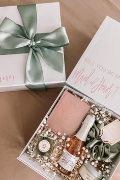 two gift boxes with different items in them