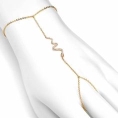 Adorn your hand with this sexy snake hand bracelet, featuring 32 microset diamonds set in 14k gold. SKU: B0100149 Total diamond weight: 0.10ct Hand Chain Bracelet, Chain Loop, Snake Jewelry, Snake Bracelet, Hand Bracelet, Hand Chain, Hand Jewelry, Snakes, Chain Bracelet