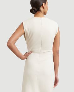 An architectural silhouette in luxe cotton twill, Iman is a classic in the making. With an elegant neckline, chic ruching, and a split-hem for ease, this dress is an easy choice for any upcoming occasions. See below for our general Size Guide and available measurements Self made of 97% cotton and 3% spandex, lining made of 100% cotton Machine wash cold and lay flat to dry Elegant Cream Midi Dress With Button Closure, Chic Cream V-neck Dress, Cream Fitted Button-up Midi Dress, Cream V-neck Midi Dress For Daytime, White V-neck Midi Dress With Button Closure, Twill Dress, Split Hem Dress, Self Made, Cream Dress