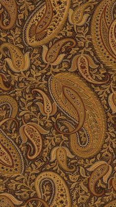 a brown and yellow paisley print fabric