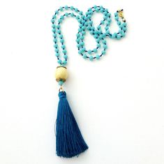 Blue tassel beaded necklace Boho blue and yellow necklace with tassel Long tassel necklace Rosary necklace  Blue beaded necklace Bohemian jewelry Gift for her Rosary blue beaded necklace, yellow ceramic big bead,  gold plated beads and blue tassel A perfect necklace great for beachwear and layering * light blue glass beads * Metal gold plated beads * Ceramic yellow bead * Blue tassel Length 53 cm / 20,8 inches The necklace will be delivered wrapped ready as gift JEWELRY CARE: Please take care of Blue Wooden Beads Jewelry For Festival, Blue Wooden Beads Festival Jewelry, Bohemian Turquoise Necklaces With Tassels, Spiritual Beaded Tassel Necklace For Beach, Turquoise Tassel Necklaces For Festivals, Adjustable Turquoise Tassel Necklaces, Blue Hand-strung Bohemian Beaded Necklaces, Bohemian Long Blue Necklace With Colorful Beads, Blue Bohemian Long Necklace With Colorful Beads