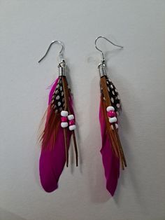 Beautiful earings made with feathers and leather string, each with its own color! Jewelry Earrings Dangle, Feathers, Dangle Drop Earrings, Dangle Earrings, Jewelry Earrings, Ships, Drop Earrings, Leather, Color