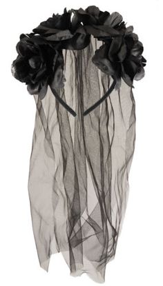 a black veil with flowers hanging from it