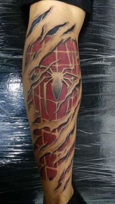 a man with a spiderman tattoo on his leg