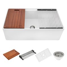 a kitchen sink with wooden cutting board and strainer