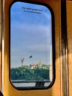 a window with a view of the city from it