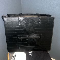 Large Tote With Two Shoulder Straps And An Extra Strap To Carry It Longer. Used Probably 4 Times. Best Offer! Chic Black Large Capacity Briefcase, Chic Black Briefcase With Large Capacity, Black Top Handle Laptop Bag For Office, Black Crossbody Briefcase For Office, Black Office Briefcase Shoulder Bag, Black Tote Briefcase With Detachable Handle, Black Briefcase Tote With Detachable Handle, Chic Black Rectangular Laptop Bag, Formal Black Briefcase With Large Capacity