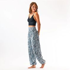 Lotus and Luna Harem Style Pants Casual Harem Bottoms For Beach, Blue Baggy Harem Pants For Summer, Ankle-length Blue Harem Pants For Vacation, Casual Summer Harem Yoga Pants, Baggy High Waist Harem Pants For Vacation, Casual Harem Yoga Pants For Summer, Bohemian Style Yoga Pants For Loungewear, Blue Relaxed Fit Harem Pants For Vacation, Beach High-waisted Relaxed Fit Harem Pants