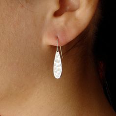 "These sterling silver teardrops dangle from sterling silver ear wires for a beautifully simple look.  ROSE GOLD VERSION: https://www.etsy.com/listing/561692201 (see photos above) Perfect for everyday. Silver Teardrop measures 20x5mm or 1/4 x 3/4\" and total length of  earrings or 1\" from the top of the ear wire to the bottom of the teardrop. Your item comes wonderfully boxed and wrapped so you can give it as a gift - or enjoy opening it as a gift yourself! MATCHING SILVER TEARDROP NECKLACE --- Teardrop Earrings Wedding, Teardrop Silver Earrings, Silver Earrings Wedding, Teardrop Bridal Earrings, Silver Bridesmaid, Wedding Earring, Bridesmaid Gifts Jewelry, Teardrop Dangle Earrings, Bridesmaid Jewelry Sets