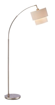 a lamp that is on top of a metal stand with a white shade over it