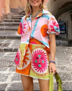 This bold and colorful set is the must have look for your summer travels! Perfect for over a swim suit by the pool or paired with some spunky espadrilles for a day exploring, this set features a fully button up short sleeved top and matching patchwork print shorts. The collar, hems, and arms are adorned with a fun wavy trim to add even more life to this whimsical set! Sold as a set. Price reflects two pieces sold together. Blue Jean Dress, Heavy Sweaters, Queen Dress, White Dress Party, 16 29, Frayed Denim, Prom Outfits, Pants Suit, Short Sleeve Pattern