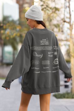 Step into nostalgia and comfort with our Classic Logo Oversized Sweater. Made for both men and women, this high-quality cotton sweater blends timeless style and durability. Its oversized fit and iconic logo add a touch of vintage to any outfit. Versatile and cozy, it's perfect for everyday wear or making a statement. Whether you love its retro vibes or seek ultimate comfort, this sweater is a must-have. Elevate your style effortlessly with this iconic, top-quality sweater--an essential for classic fashion and lasting comfort. Embrace the blend of nostalgia and modern fashion with our premium sweater. 🌱 SAVING THE TREES WITH EACH PURCHASE 🌱 With every purchase you make, we pledge to plant a tree. Your support not only benefits the environment but also transforms lives. Join us in planting Oversized Slogan Sweater For Streetwear, Gray Oversized Sweater For College, Branded Long Sleeve Sweatshirt For Loungewear, Oversized Crew Tops With Letter Print, Trendy Oversized Sweatshirt With Logo Print, Oversized Gray Sweater For College, Oversized Crew Sweatshirt With Letter Print, Oversized Sweater For Streetwear With Branding, Gray Relaxed Fit Sweater With Letter Print