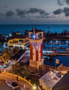 an aerial view of a harbor at night