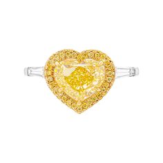 3 stone ring in Platinum & 18K Yellow Gold; Center stone: 3.40ct Natural Fancy Yellow Even VS1 Heart Shape Diamond GIA#1437671258 Side stones: 0.31ct D VS tapered baguettes Total Carat Weight pave Yellow: 0.26ct Total Carat Weight pave White: 0.23ct Size: 6 Comes with GIA, Appraisal available upon request Retail Value: $85,000 Gia Certified Heart Cut Diamond Ring, Gia Certified Heart Diamond Rings, Gia Certified Heart Shaped Fine Jewelry Ring, Three Stone Heart Cut Diamond Ring, White Gold Heart Cut Three Stone Rings, Fine Jewelry Three Stone Heart Cut Rings, Fine Jewelry Heart Cut Three Stone Rings, 3 Stone Ring, Cowry Shell