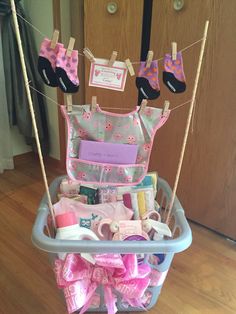 a basket filled with lots of items on top of a wooden floor