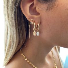 A mix between edge and elegance, the Juli Earring Set is a 5-piece favorite! Featuring a unique assortment of styles with pretty pearl adornments this set makes for a true ear party. Layered Earrings Ear Piercings, Mixing Metals Earrings, Gold And Silver Earring Stack, Three Piercing Stack, Beachy Earring Stack, Gold Earring Stack Ideas, Gold And Silver Earrings Mixing, Different Piercings Ear, Gold Earrings Stack