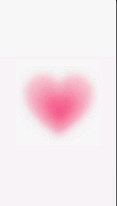 a red heart shaped object on a white background with the word love written below it