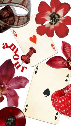 red flowers and playing cards on a white background with the word love spelled below them