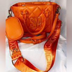 Steve Madden Mango Bbabi Crossbody Bag Orange Shoulder Bag With Detachable Handle For On-the-go, Orange Bag With Top Carry Handle For On-the-go, Orange Shoulder Bag With Top Carry Handle For Shopping, Orange Shoulder Bag With Top Handle For Shopping, Orange Pouch Shoulder Bag With Detachable Handle, Orange Pouch Bag For On-the-go, Casual Orange Satchel With Double Handle, Trendy Orange Pouch Bag, Chic Orange Shoulder Satchel