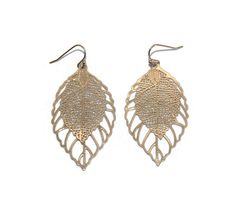 This item is a pair of vintage gold tone dangle leaf earrings. They have French ear wire backs for pierced ears. Lightweight and ready for the Autumn season.  DETAILS:   ☼ Approximately 1 1/8 by 2 inches, 2 1/4 inch drop. ☼ Approximately 4.4 grams total weight. ☼ ☼ ☼ ☼ ☼ ☼ ☼ ☼ ☼ ☼ ☼ ☼ ☼ ☼ ☼ ☼ ☼ ☼ ☼ ☼ ☼ PLEASE NOTE:  ☼ Different items on SALE everyday!  Check back often to take advantage of these bargains! ☼ FREE DOMESTIC SHIPPING on purchases of $35 or more. Combined shipping is still available Yellow Gold Leaf-shaped Brass Earrings, Pierced Leaf-shaped Metal Earrings, Metal Leaf-shaped Pierced Earrings, Metal Leaf Shaped Earrings, Gold Leaf-shaped Nickel-free Earrings, Nickel Free Leaf-shaped Metal Earrings, Nickel-free Leaf-shaped Metal Earrings, Nickel-free Metal Leaf-shaped Earrings, Gold Leaf-shaped Earrings