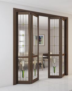 an open glass door in the middle of a room with white walls and flooring