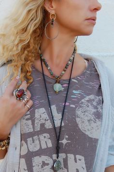 Spirit Lala Vintage Coin: Recycled Glass Bead Drop Necklace ♡ Product Highlights ♡ Our Spirit Lala Vintage Coin: Recycled Glass Bead Drop Necklace is the perfect accessory to add to any on-trend bohemian style outfit! Layered and paired with any of our many statement necklaces, earrings, and bracelets, of your choosing, the Spirit Lala Vintage Coin: Recycled Glass Bead Drop Necklace will be sure to be a wonderful addition to any necklace layering style! ✁ Contents & Measurements ✁ Our Spirit Lal Handmade Bohemian Lariat Beaded Necklace, Bohemian Lariat Beaded Necklace With Gemstones, Handmade Bohemian Beaded Lariat Necklace, Bohemian Agate Beaded Chain Necklace, Turquoise Bohemian Beaded Necklaces For Layering, Bohemian Lariat Necklace For Meditation, Bohemian Necklaces With Natural Stones, Turquoise Bohemian Beaded Necklace For Layering, Bohemian Beaded Necklace For Meditation