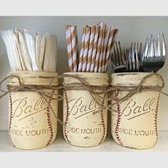 three mason jars filled with different types of utensils