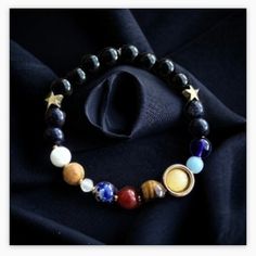 *This unique accessory features nine distinct beads, each meticulously chosen to represent the celestial bodies of our captivating solar system: Mercury, Venus, the Moon, Earth, Mars, Jupiter, Saturn, Uranus, and Neptune. Handmade Universe Galaxy the Eight Planets Gemstone Bracelet *Indulge in the celestial allure of our solar system bracelet, a remarkable testament to the wonders of the universe. *Meet the miracles of natural stones without sacrificing your elegance.I make it every day, so ship Adjustable Celestial Beaded Bracelets As Gifts, Adjustable Celestial Gemstone Beads Jewelry, Adjustable Celestial Bracelets With Round Beads, Adjustable Celestial Bracelet With Round Beads, Celestial Style Beaded Bracelets As Gift, Handmade Celestial Beaded Bracelets With Round Beads, Celestial Style Adjustable Beaded Bracelets With Round Beads, Adjustable Celestial Beaded Bracelets With Round Beads, Planet Bracelet