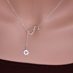 "Sterling Silver Infinity Heart Necklace The picture length is 17\" , it could be shorter or longer , depend on customer choice. Perfect express for infinity love. The Picture length is 17\". ★It consists of... -Sterling Silver 8x10.9mm Heart Cutout Charm, -Sterling Silver Infinity link, and -Sterling silver cable chain with spring claw and -One set of Care instruction package. Total length will be 15\",16\", 17\",18\" ,19\" or 20\" that will not be count 1\" dangle. MORE HEART NECKLACES https:/ Infinity Jewelry As A Gift For Mom, Adjustable Jewelry For Anniversary Gift, Infinity Jewelry For Valentine's Day Gift For Mom, Infinity-shaped Jewelry For Mom For Valentine's Day, Valentine's Day Infinity Jewelry Gift For Mom, Infinity Necklace For Mom On Valentine's Day, Infinity Necklace For Birthday Or Valentine's Day, Adjustable Heart Pendant Lariat Necklace For Valentine's Day, Adjustable Lariat Necklace With Heart Charm As Gift