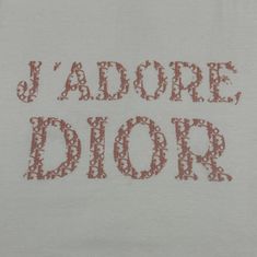 a white t - shirt with the words jadore dior printed on it