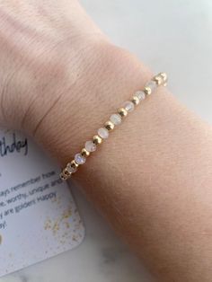 The golden birthday is something special, something to be celebrated! This beautiful natural faceted quartz and gold fill bead bracelet is a perfect gift for a super special day.   Each order comes with a sweet message to wish a Happy golden birthday, all ready to give as a gift.  Alternating design of non tarnishing gold fill beads and faceted quartz beads.  These natural stones do have some color variation for a beautiful and natural look.  each bracelet is handmade by me and sized just right Gold Minimalist Stretch Bracelet As Gift, Minimalist Gold Stretch Bracelet For Gift, Gold Dainty Bracelet For Birthday, Dainty Gold Bracelets For Birthday, Dainty Gold Stretch Bracelet As Gift, 14k Gold-filled Faceted Bead Bracelets As Gifts, 14k Gold Filled Faceted Beads Bracelet As Gift, Gold Beaded Bracelets For Birthday, Gold Beaded Bracelet For Birthday Gift