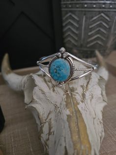 Sterling Silver Oval Turquoise Stone Cuff Bracelet Silver Drops Twisted Wire Native American Hand Made by Marie Bahe Signed by the Artist Unique Blue Oval Cuff Bracelet, Oval Turquoise Cuff Bracelet As Gift, Blue Oval Gemstone Cuff Bracelet, Unique Turquoise Oval Cuff Bracelet, Unique Oval Turquoise Cuff Bracelet, Southwestern Blue Oval Bracelets, Handmade Turquoise Oval Cuff Bracelet, Bohemian Oval Gemstone Cuff Bracelet, Unique Oval Gemstone Cuff Bracelet