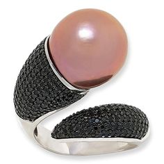 Elevate your style with the Kwan Collections Cultured Pearl and Black Spinel Bypass Ring. This exquisite piece features a lustrous pink pearl paired with shimmering black spinel, set in a sleek bypass design that wraps elegantly around the finger.

- Size: 9
- Color: Pink Pearl
- Material: Sterling Silver, stamped .925 with rhodium plating
- Design: Bypass-style ring with pavé-set, round black spinel stones
- Dimensions: Approx. 7/8"L x 7/8"W x 1/2"H; shank 1/8"W
- Pearl: Cultured Freshwater Pin Plating Design, Pink Pearl Ring, Black Spinel Ring, Tahitian Black Pearls, Bypass Ring, Black Spinel, Tahitian Pearls, Pink Ring, Pink Pearl