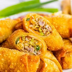 some fried food on a plate with green beans